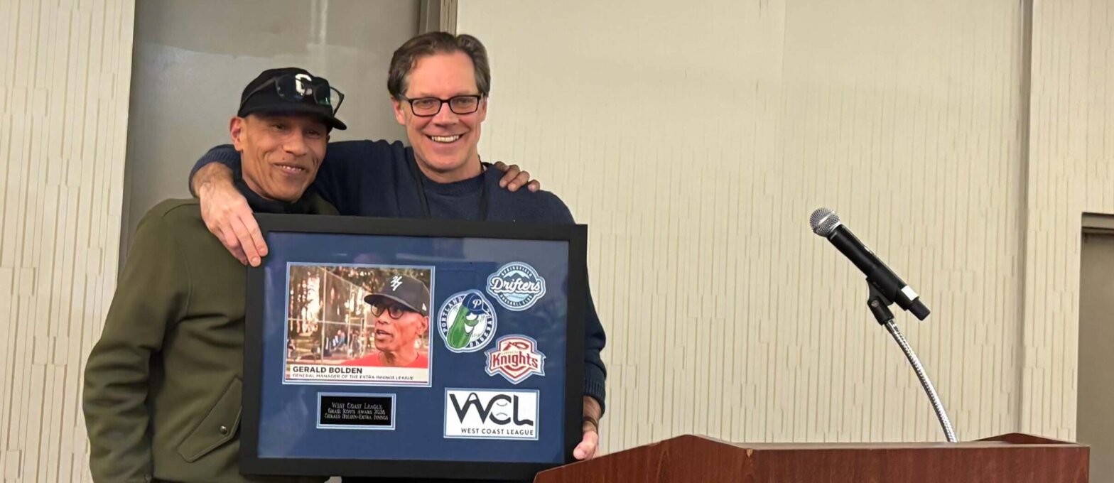 Gerald Bolden receives the 2026 Grass Roots Award from WCL Commissioner Rob Neyer.